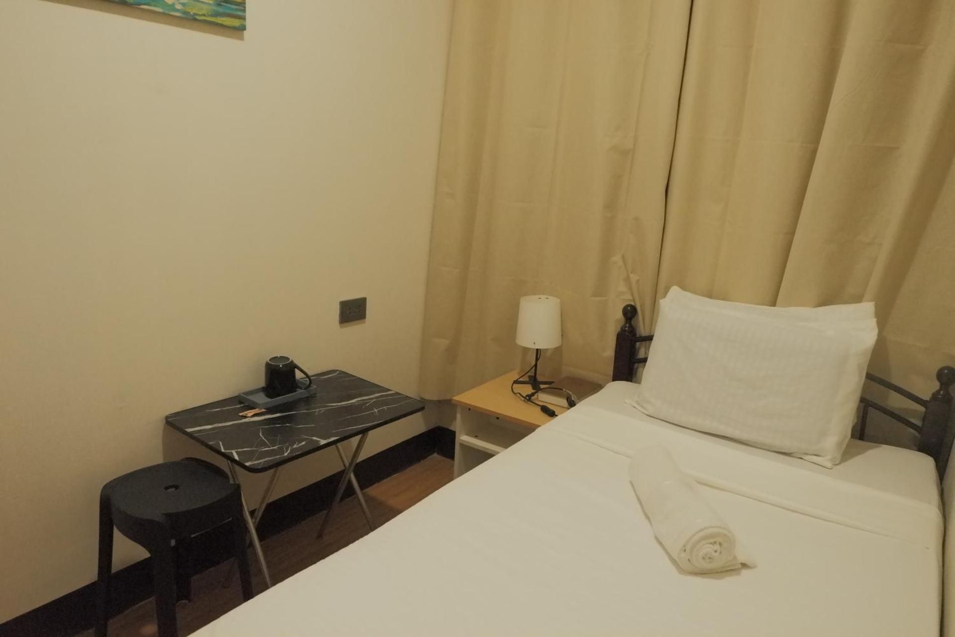 Single Fan Room with Shared Bathroom