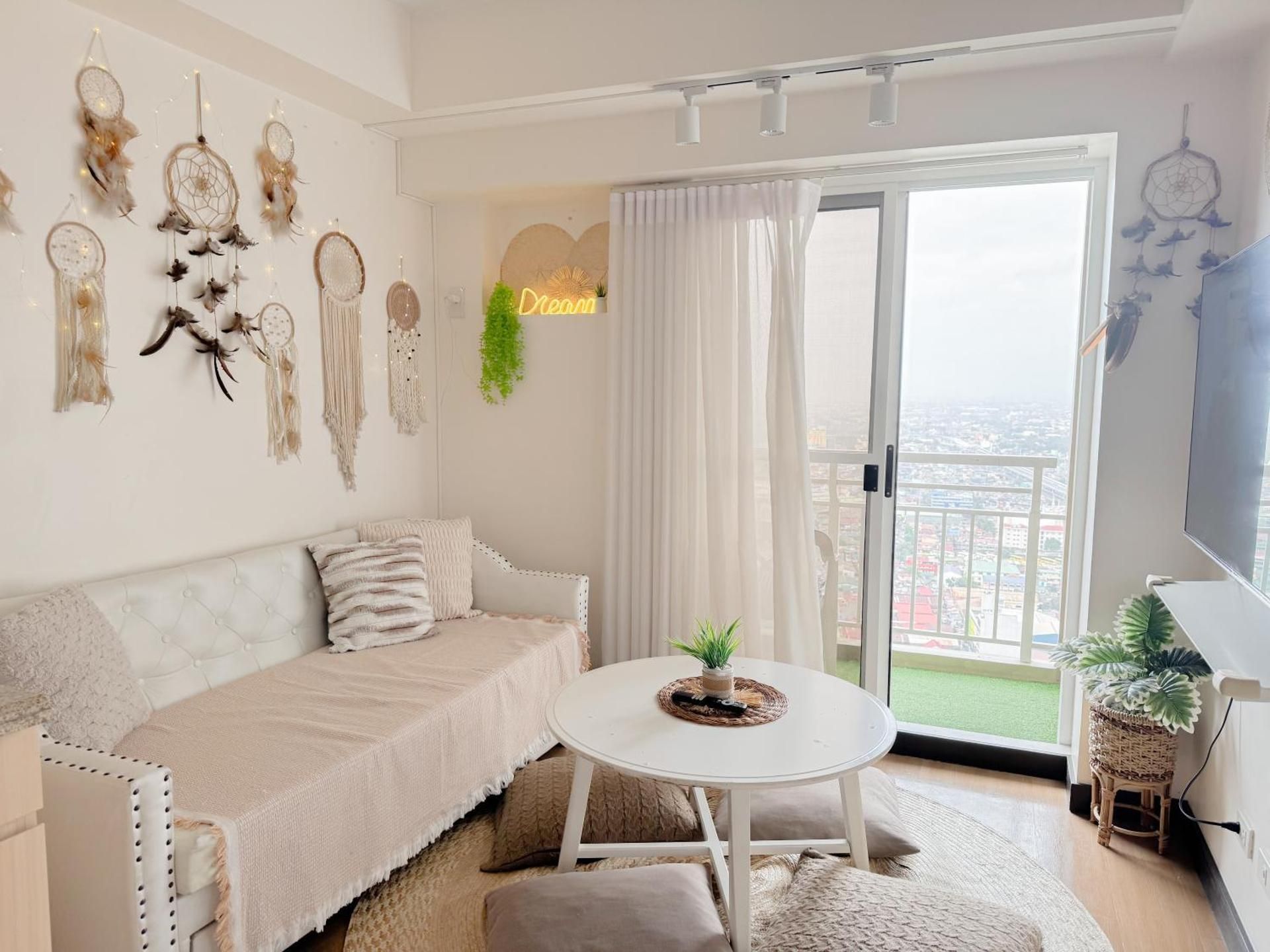One-Bedroom Apartment with Balcony and City View