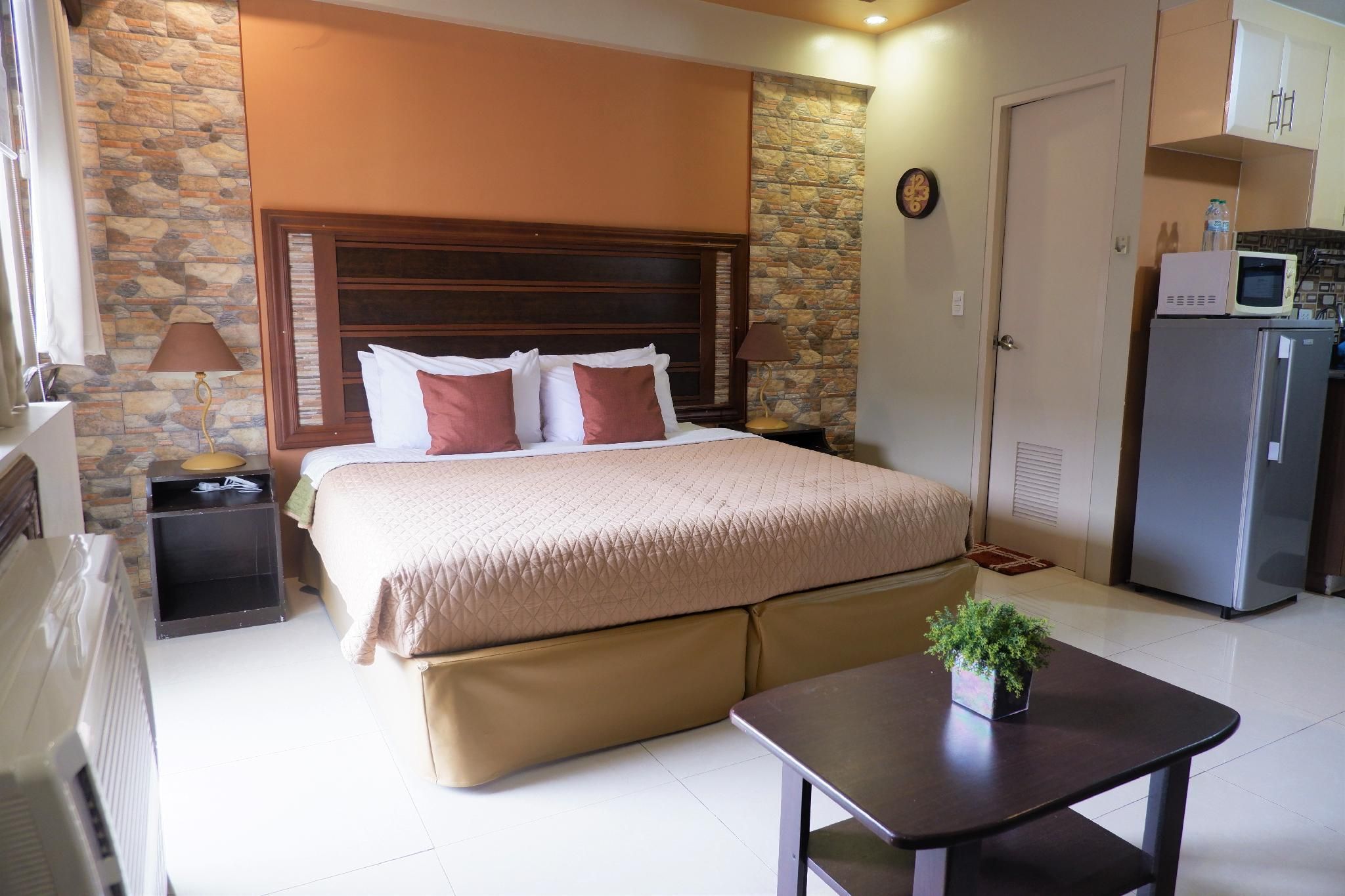 One Palmtree Villas by SMTL Properties  Standard Studio Queen Bed