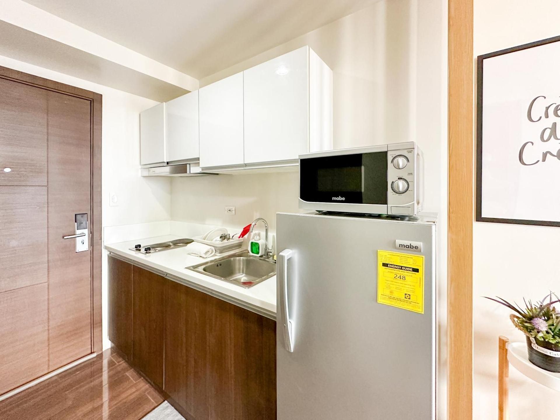 One-Bedroom Apartment with Balcony and City View