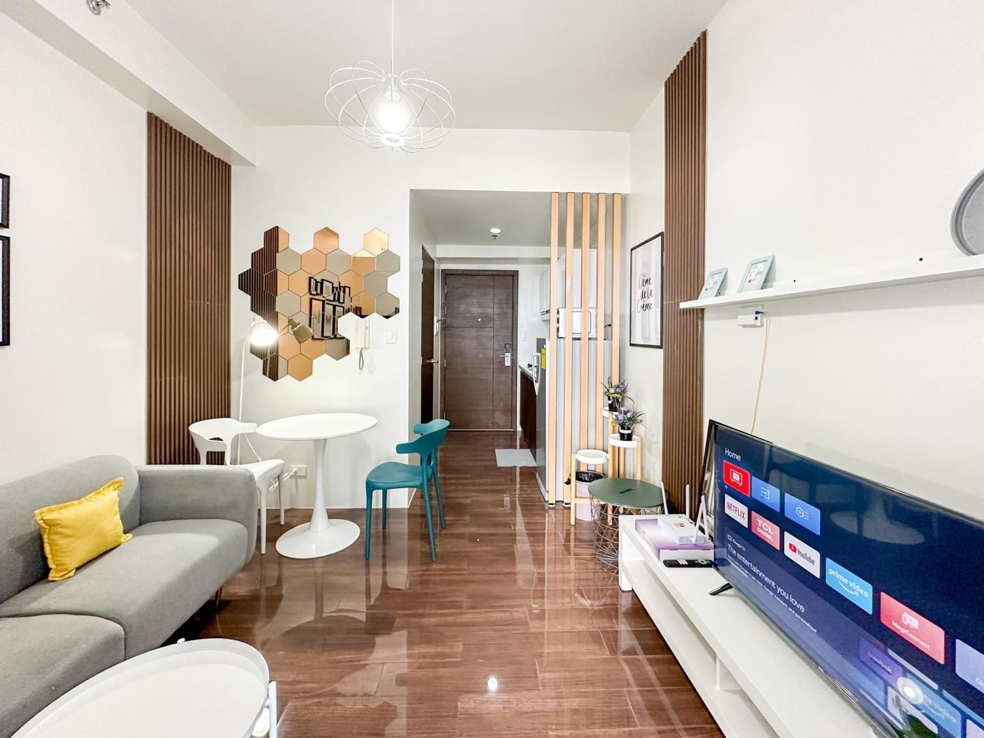 One-Bedroom Apartment with Balcony and City View