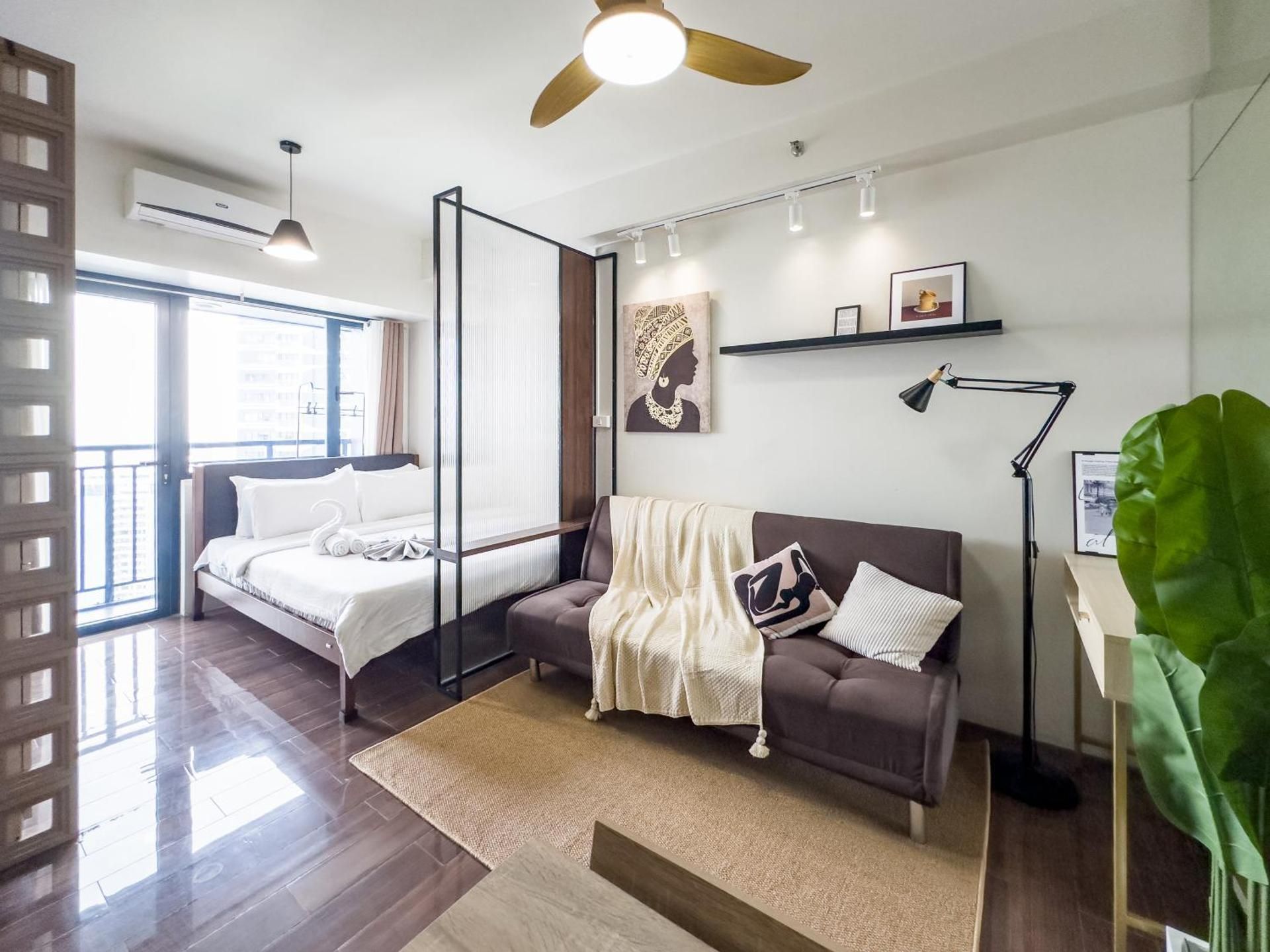 One-Bedroom Apartment with Balcony and City View