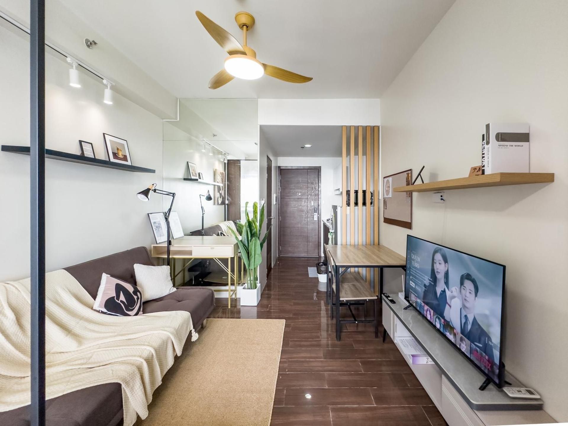 One-Bedroom Apartment with Balcony and City View