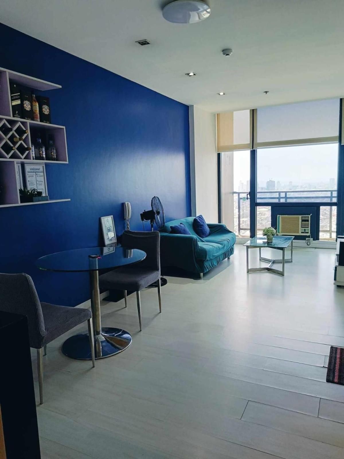 One-Bedroom Apartment with Balcony and City View