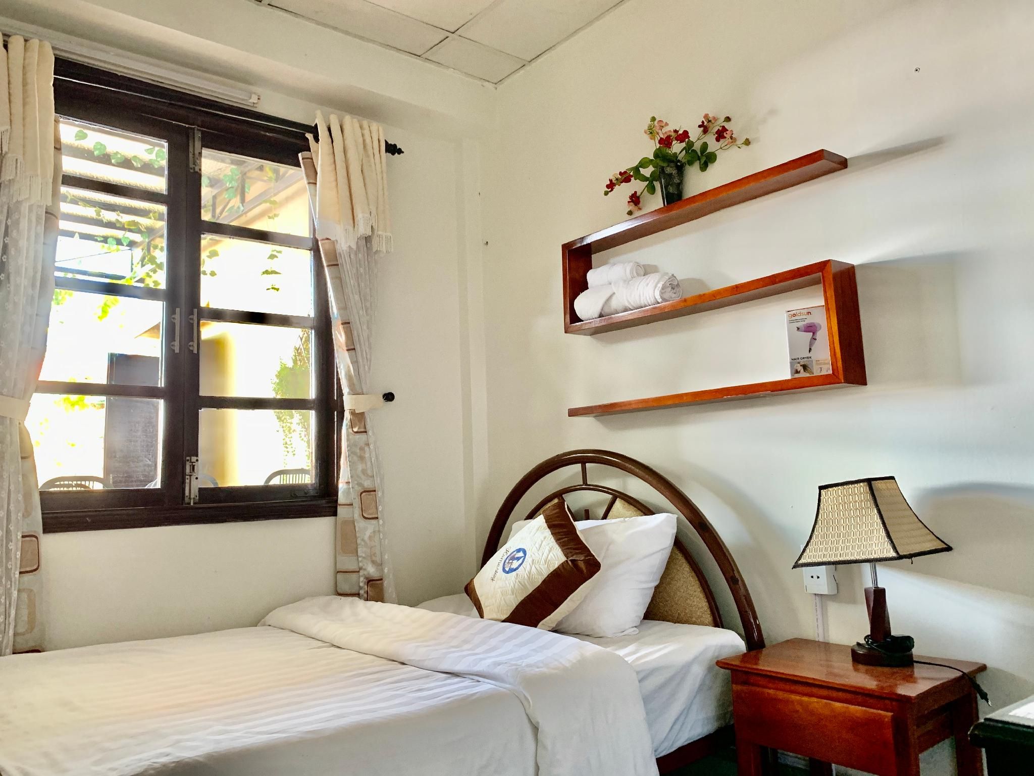 Single Room with Fan And Shared Bathroom