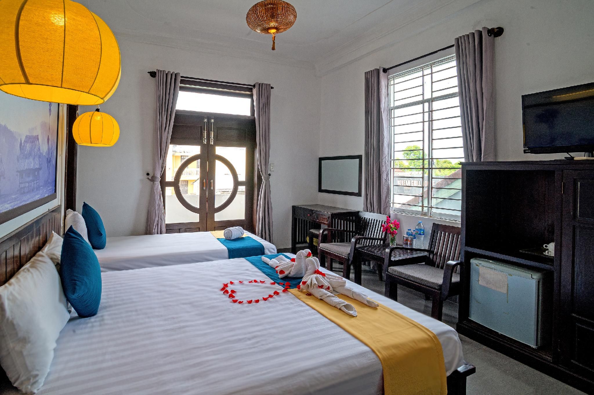 Deluxe Triple - 1 Double Bed and 1 Single Bed