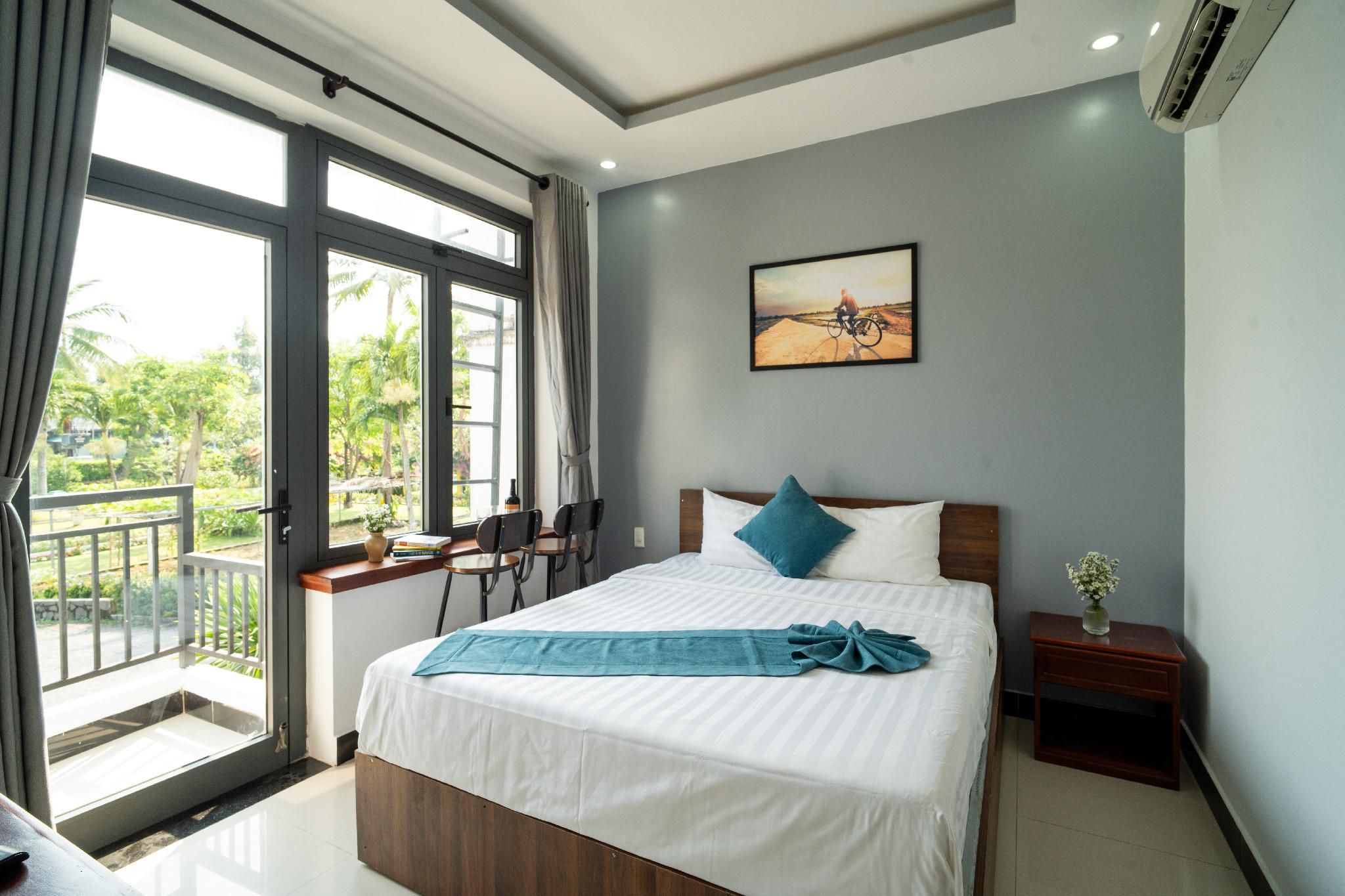 Deluxe - 1 Queen Bed