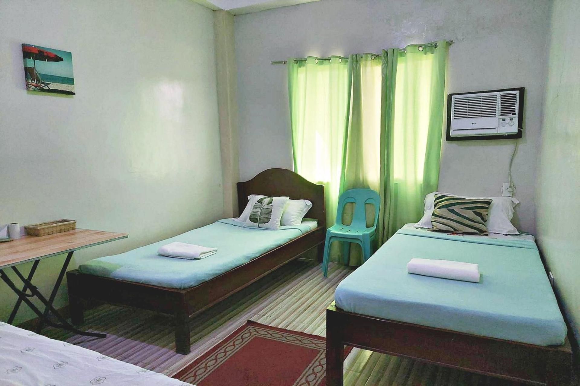 Economy Quadruple Room with Shared Bathroom