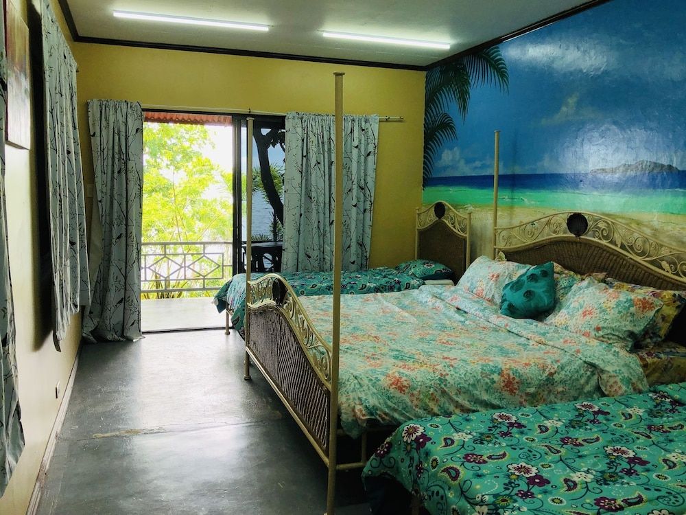 Deluxe Quadruple Room, 2 Double Beds, Non Smoking, Sea View