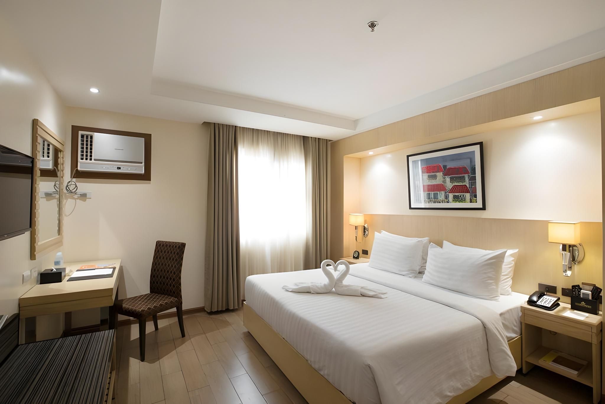 1-Bedroom Suite with King Bed and Living Room