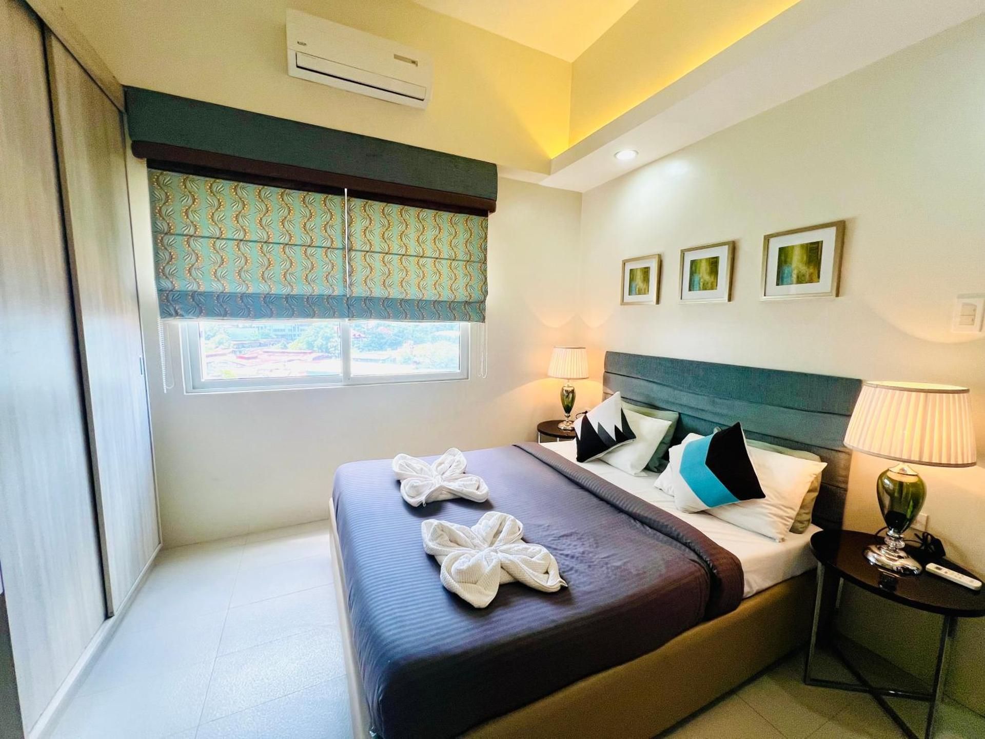 One-Bedroom Apartment with Balcony and City View