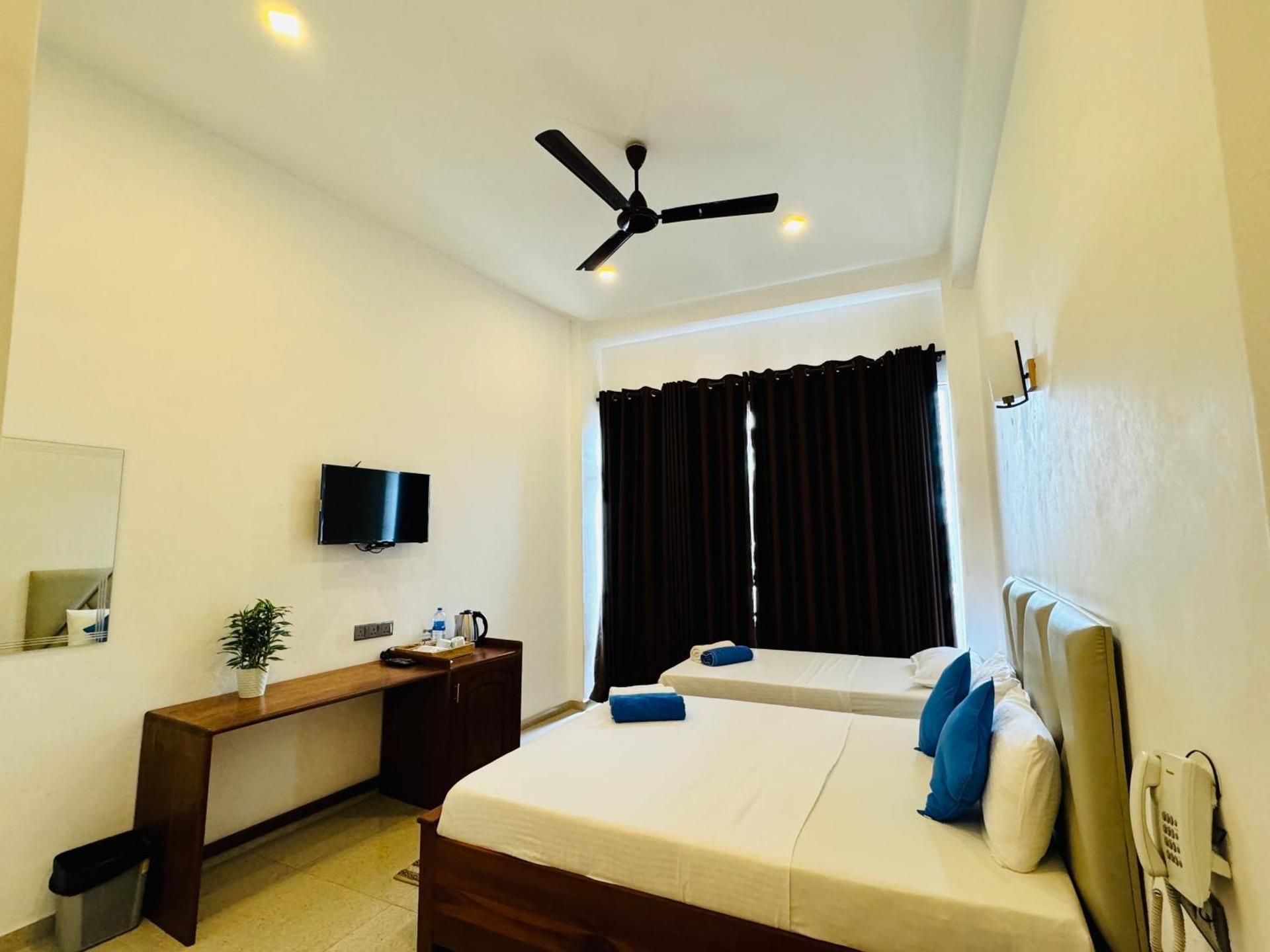 Deluxe Triple Room