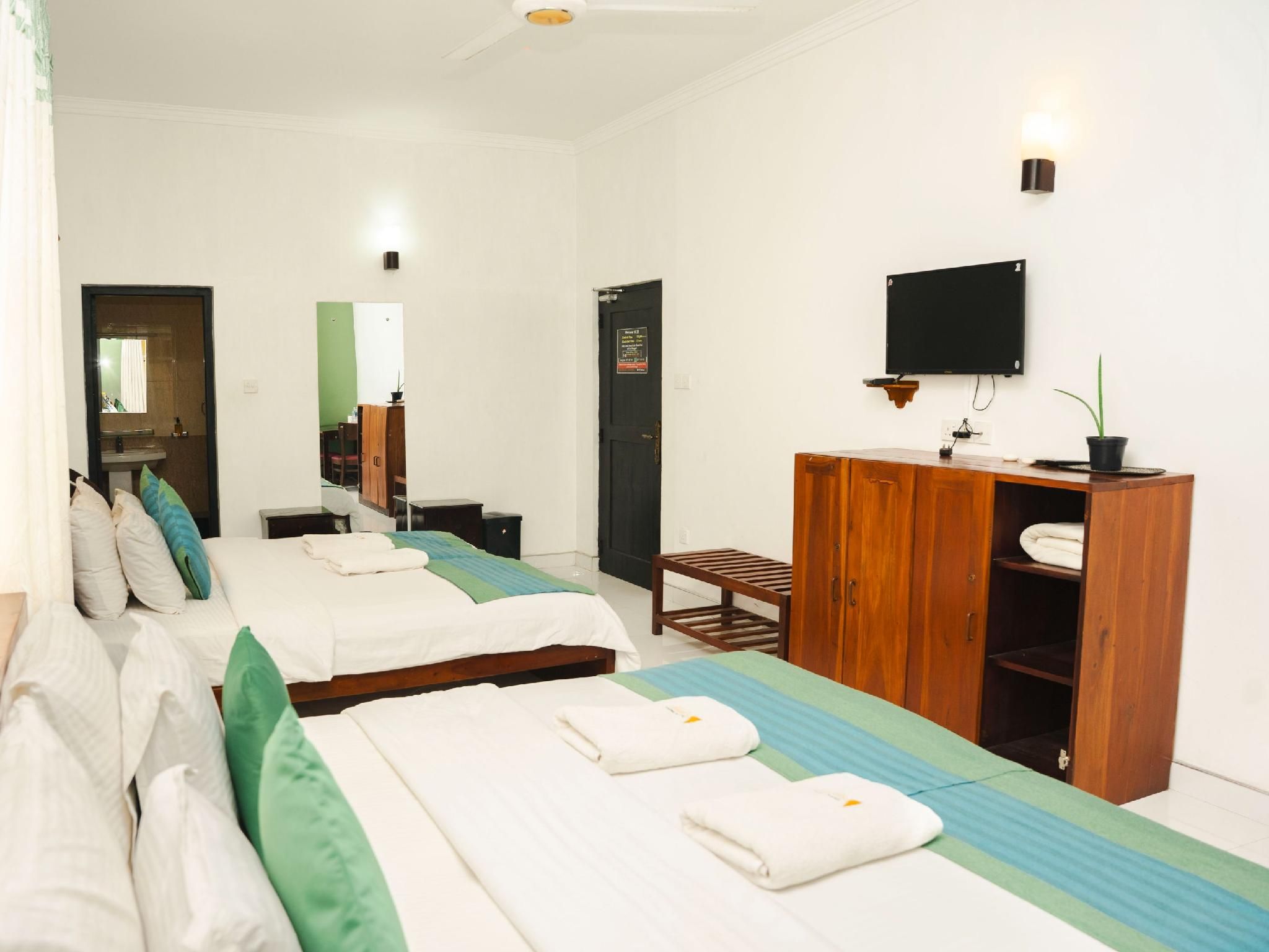 Deluxe Quadraple Room