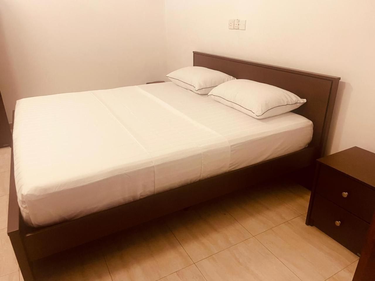 Queen Room with Shared Bathroom