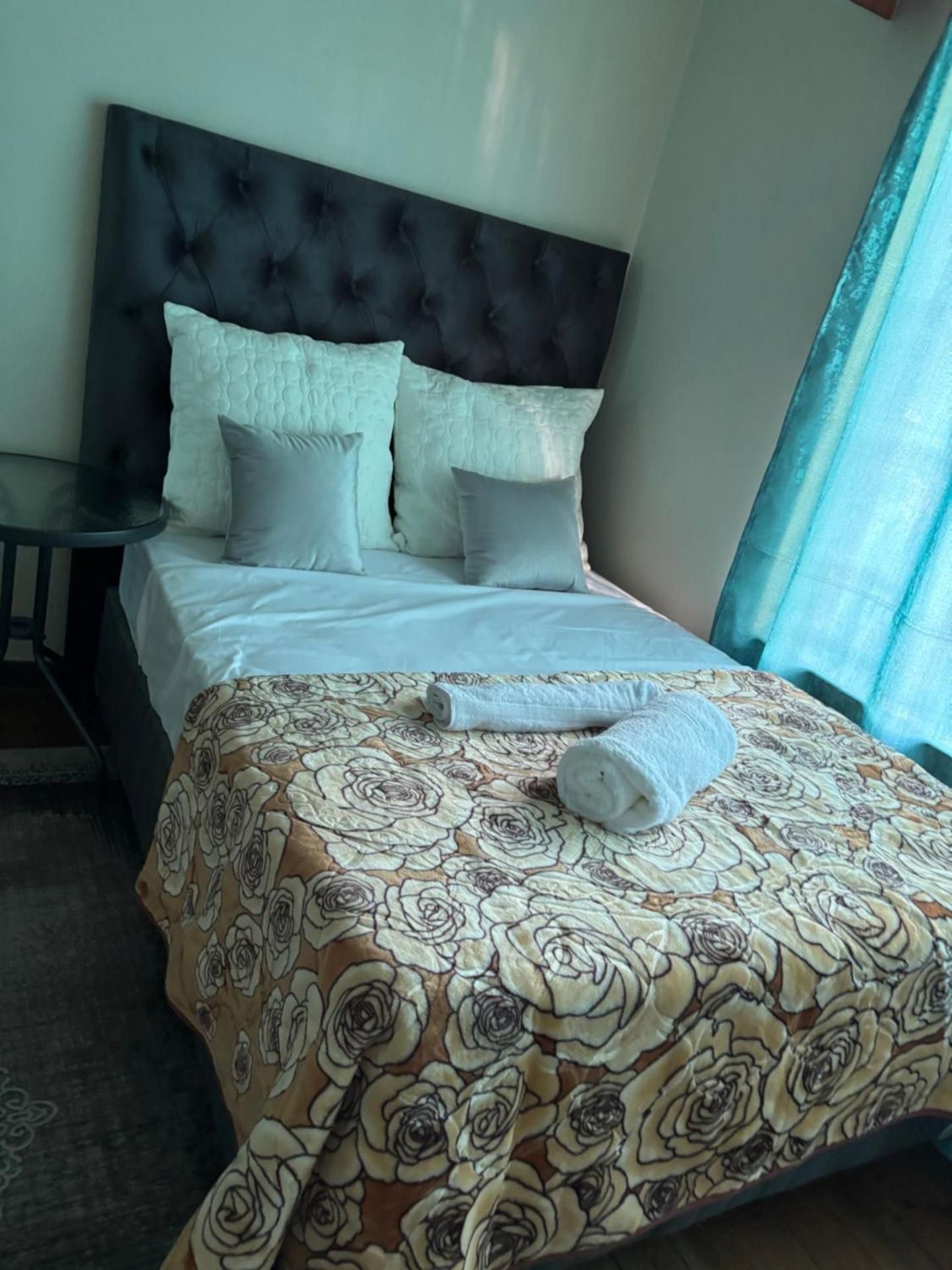 Economy Quadruple Room with Shared Bathroom