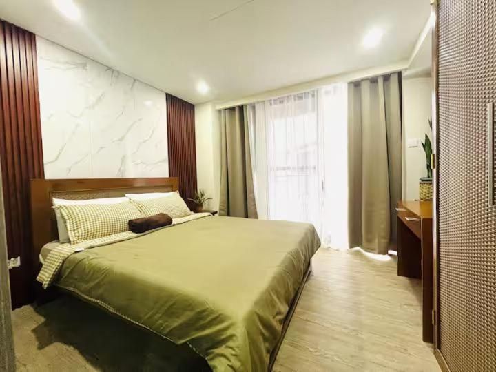 One-Bedroom Apartment with Balcony and City View