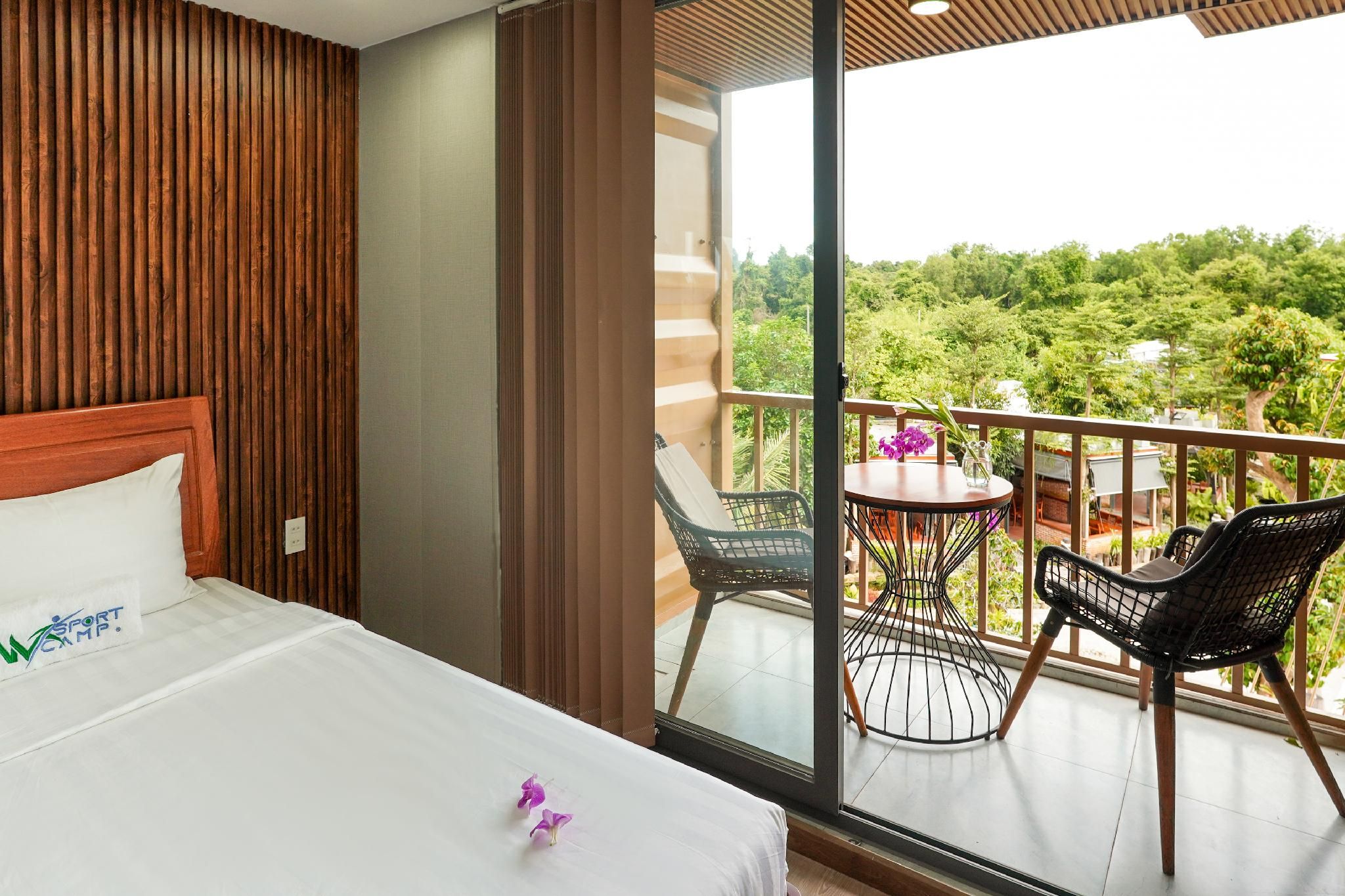 Family Room with Balcony Pool View