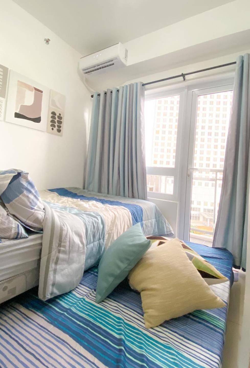 One-Bedroom Apartment with Balcony and City View