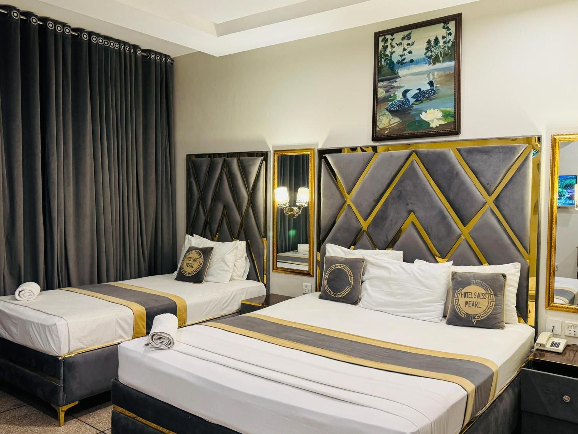 Deluxe Triple Room