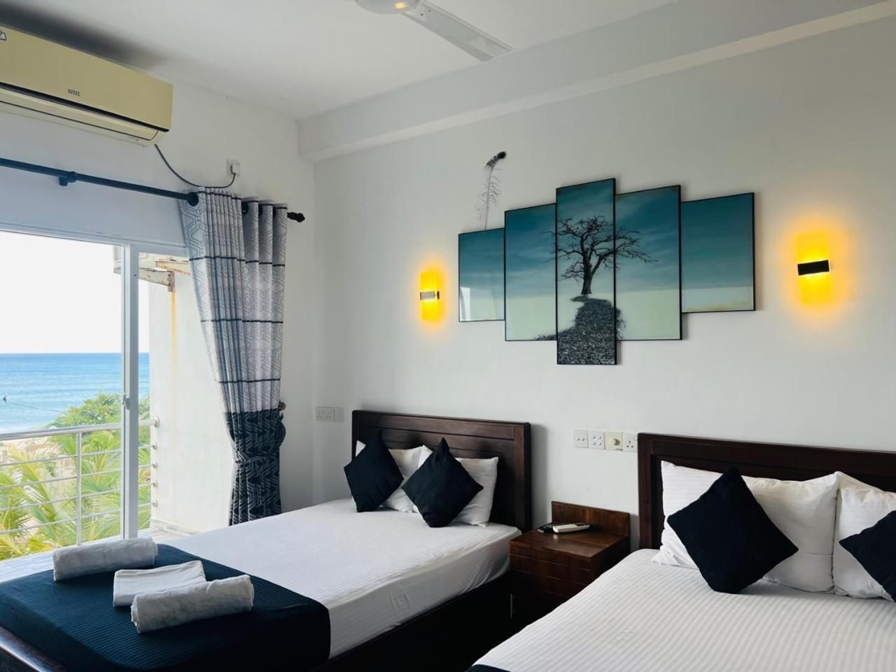 Deluxe Triple Room with Sea View