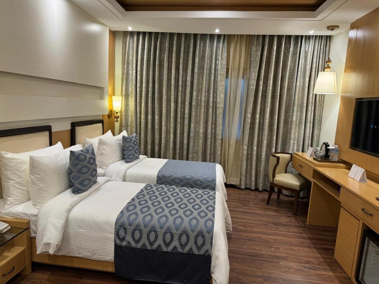 Twin Room with free city shuttle Welcome drinks Complimentary Steam, Sauna & Pool, VIP Kailashnath Mahadev Statue Tour & Live Magic Show