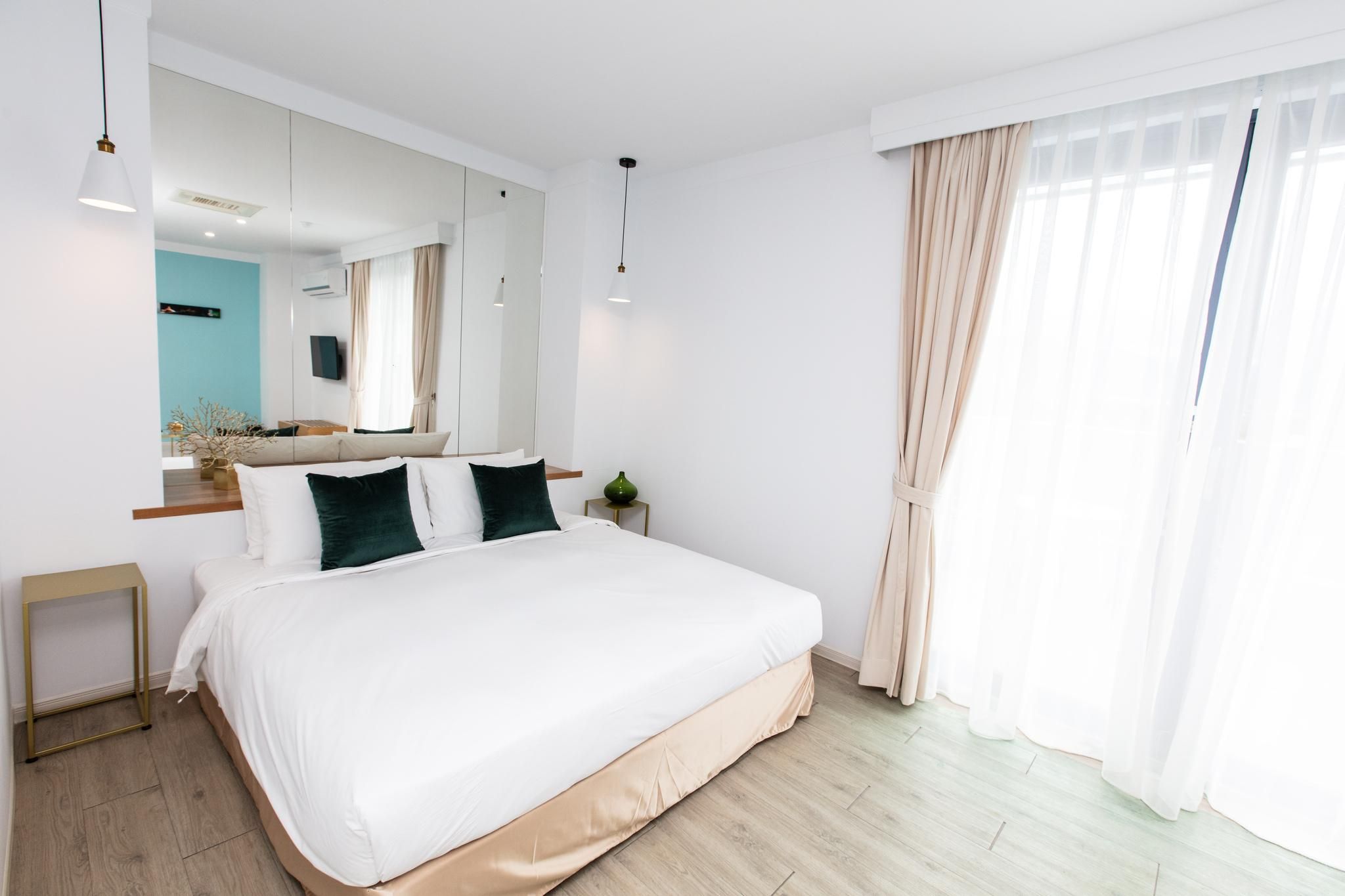 Deluxe Quadruple Room with Balcony