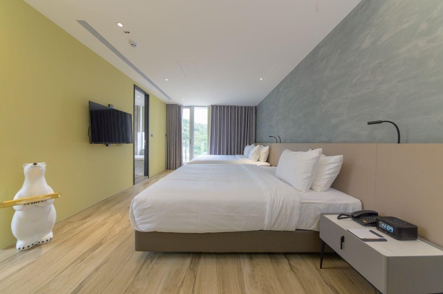 Deluxe Quadruple Room with Balcony