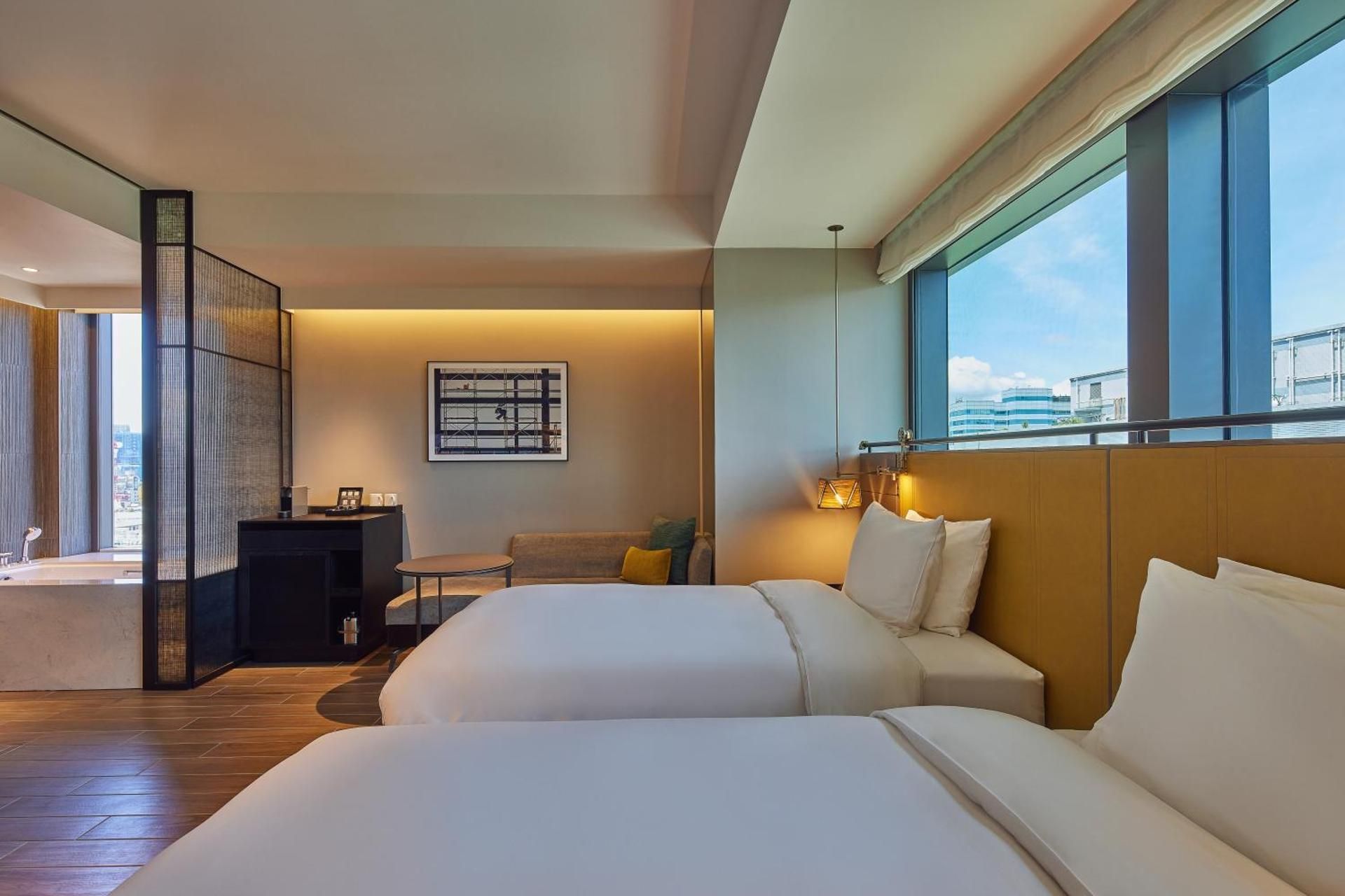 TWIN CORNER ROOM WITH 2 SINGLE BEDS