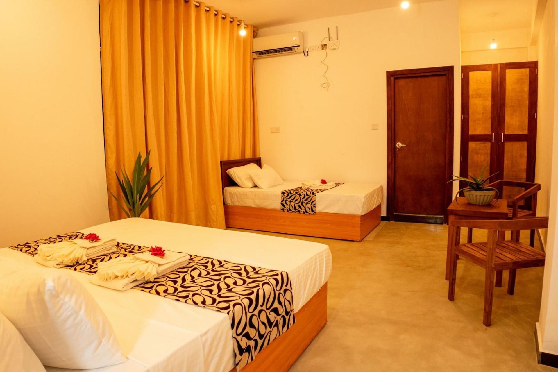 Deluxe Triple Room