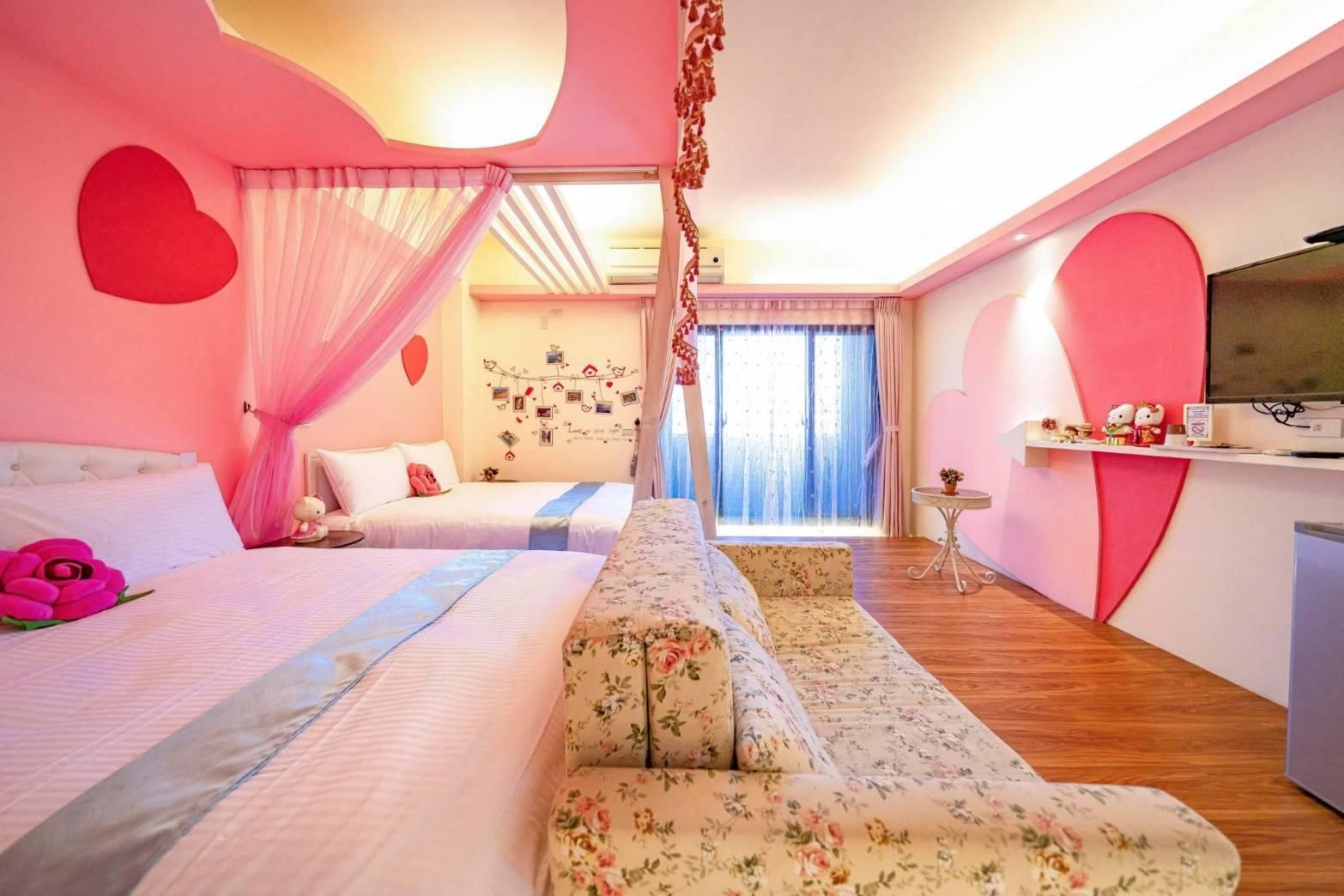 Deluxe Quadruple Room with Balcony