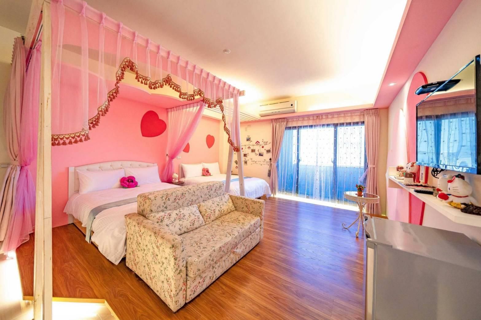 Deluxe Quadruple Room with Balcony