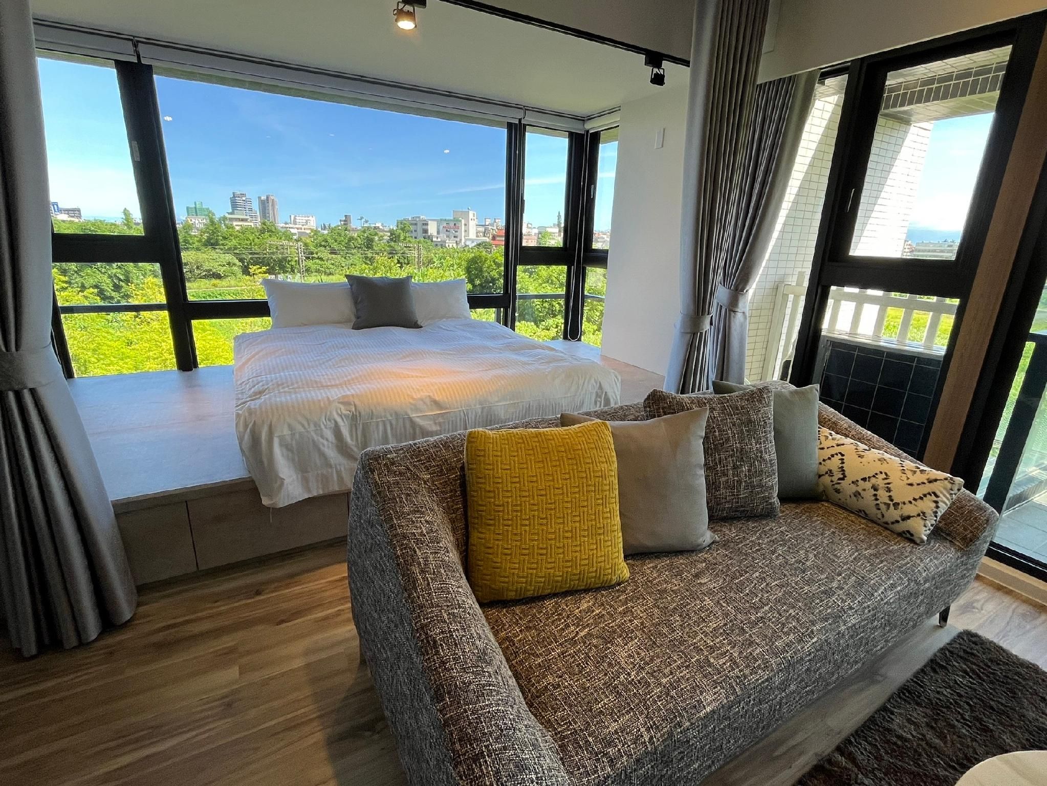 Deluxe Quadruple Room with Balcony