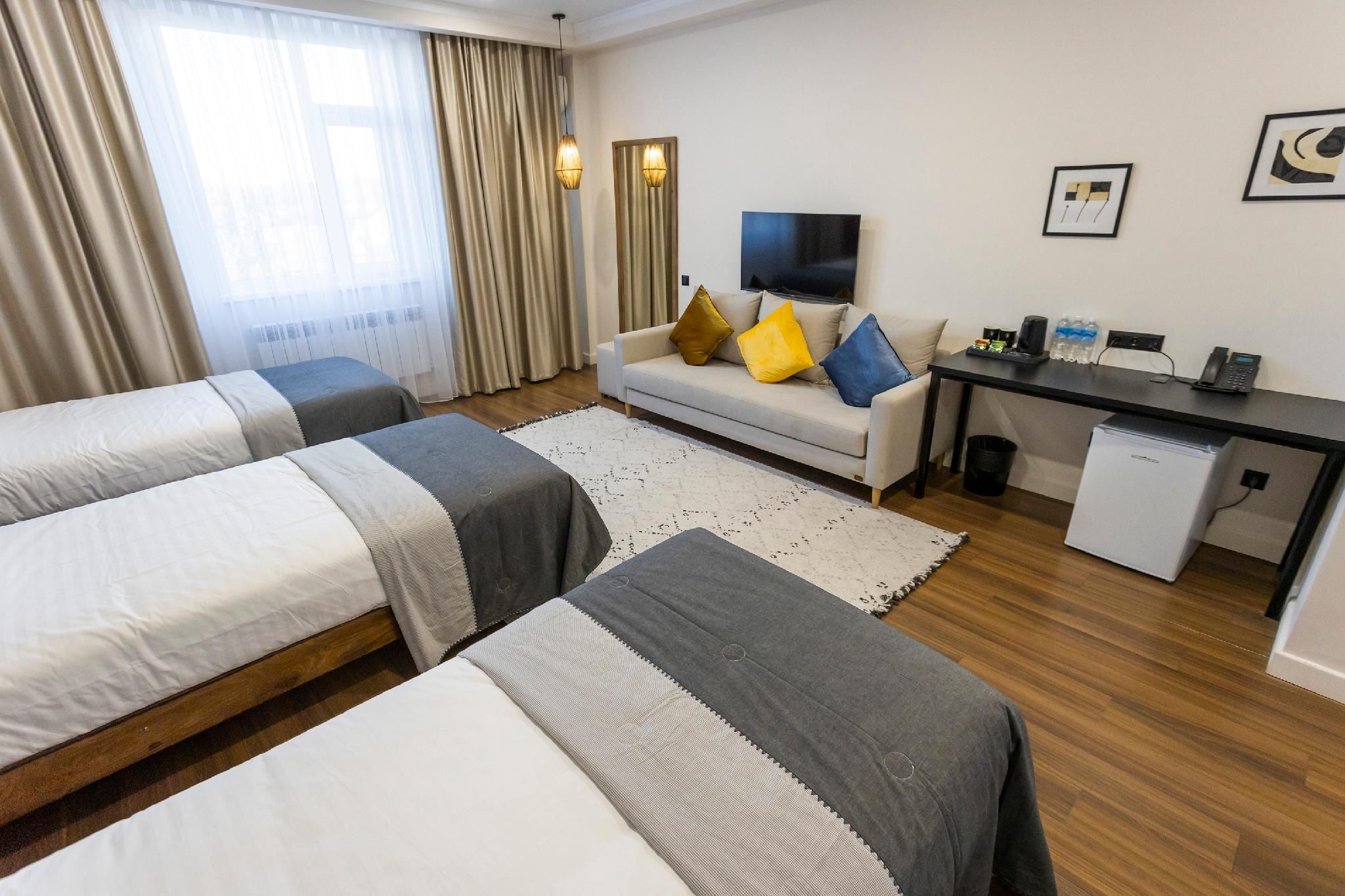 Akjola Hotel Triple Room