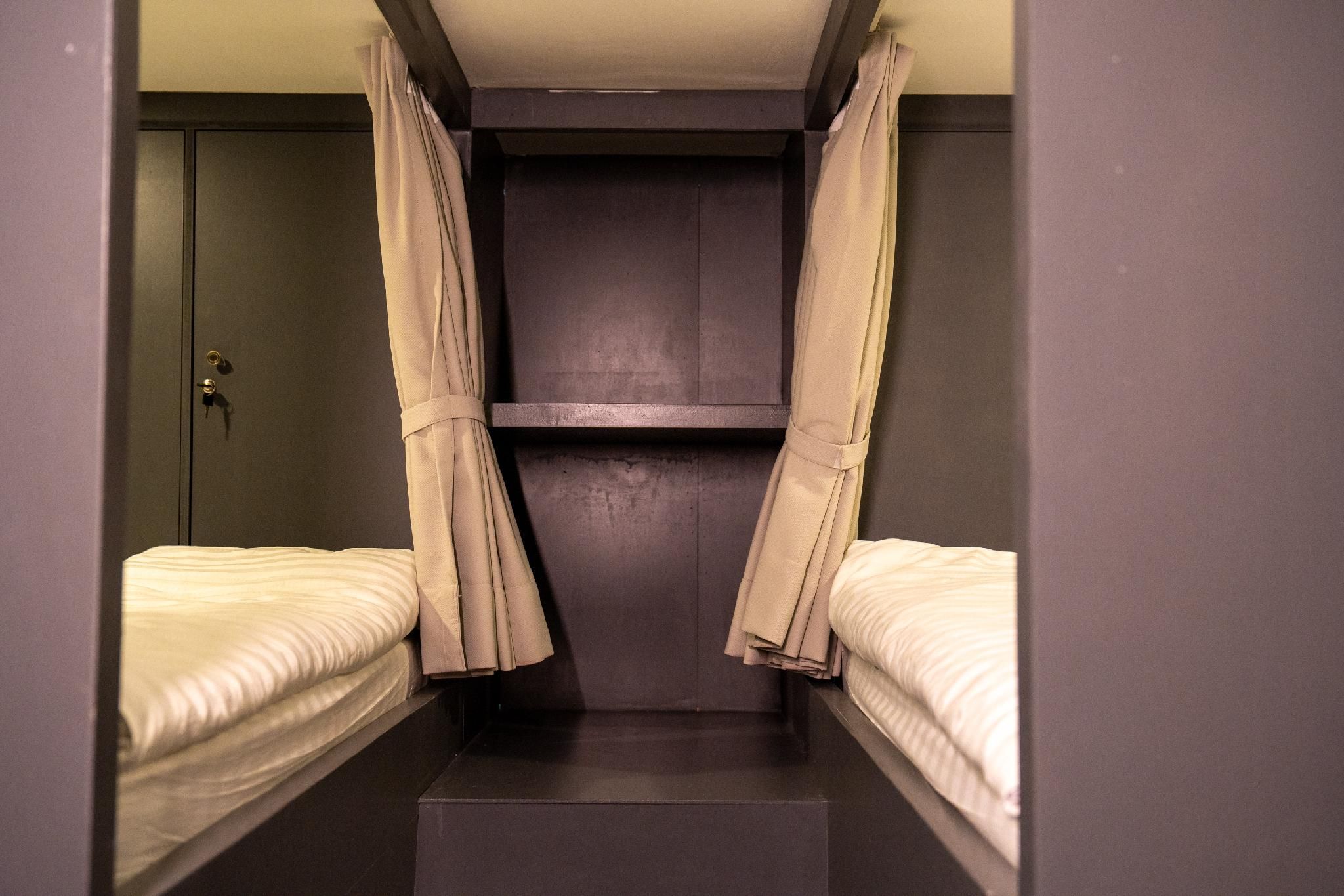 Bed in 8 Bed Mixed AC Dormitory Room with Shared Bathroom