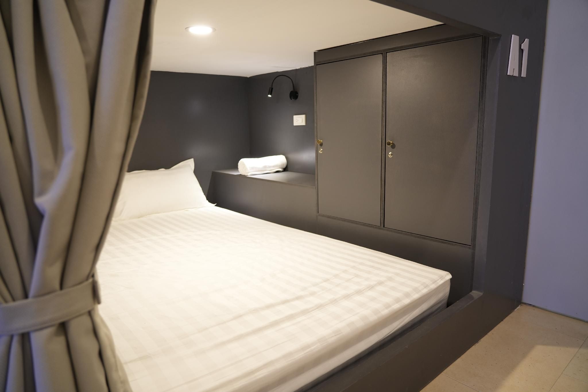 Bed in 8 Bed Mixed AC Dormitory Room with Shared Bathroom