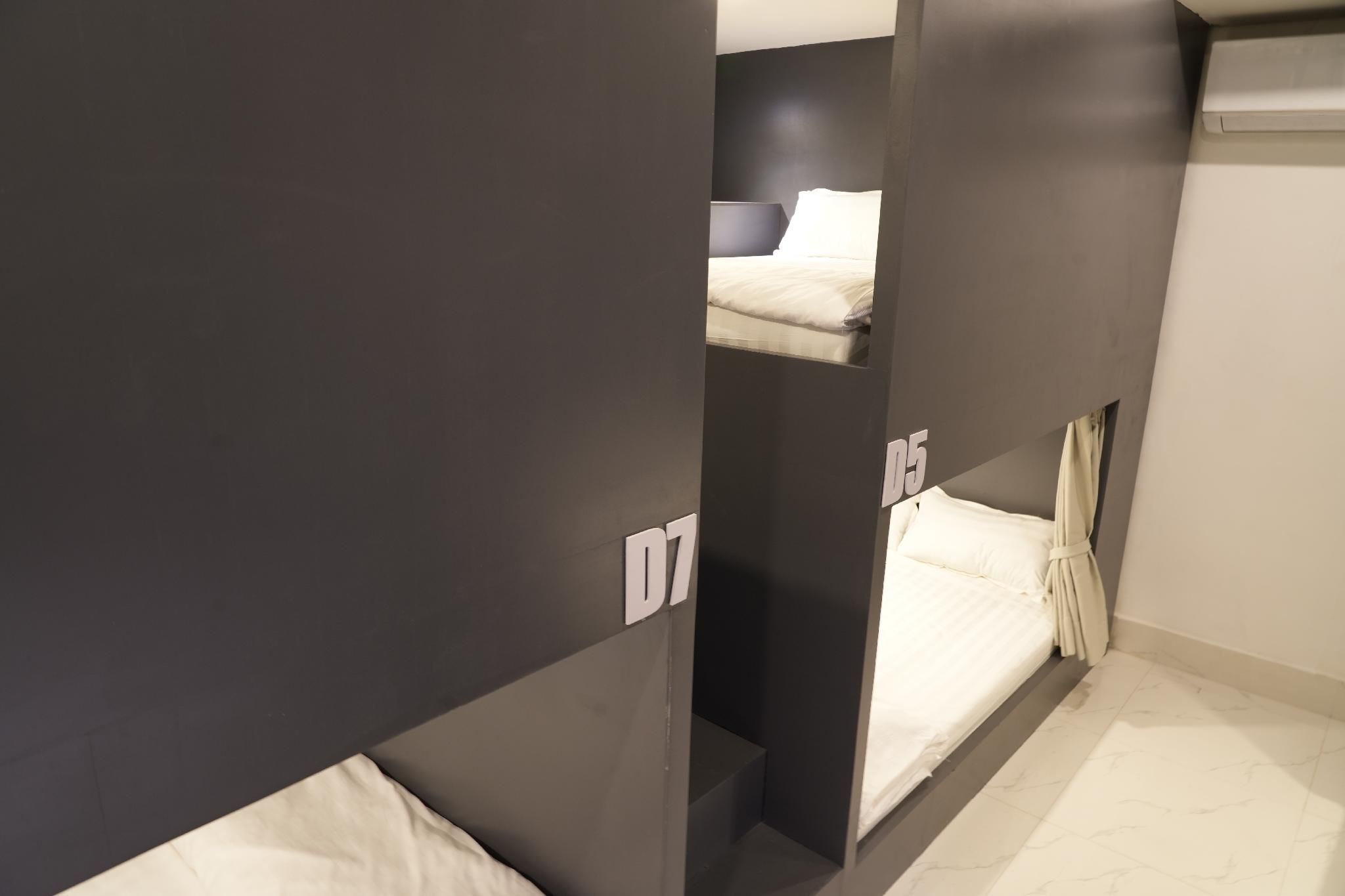 Bed in 8 Bed Mixed AC Dormitory Room with Shared Bathroom