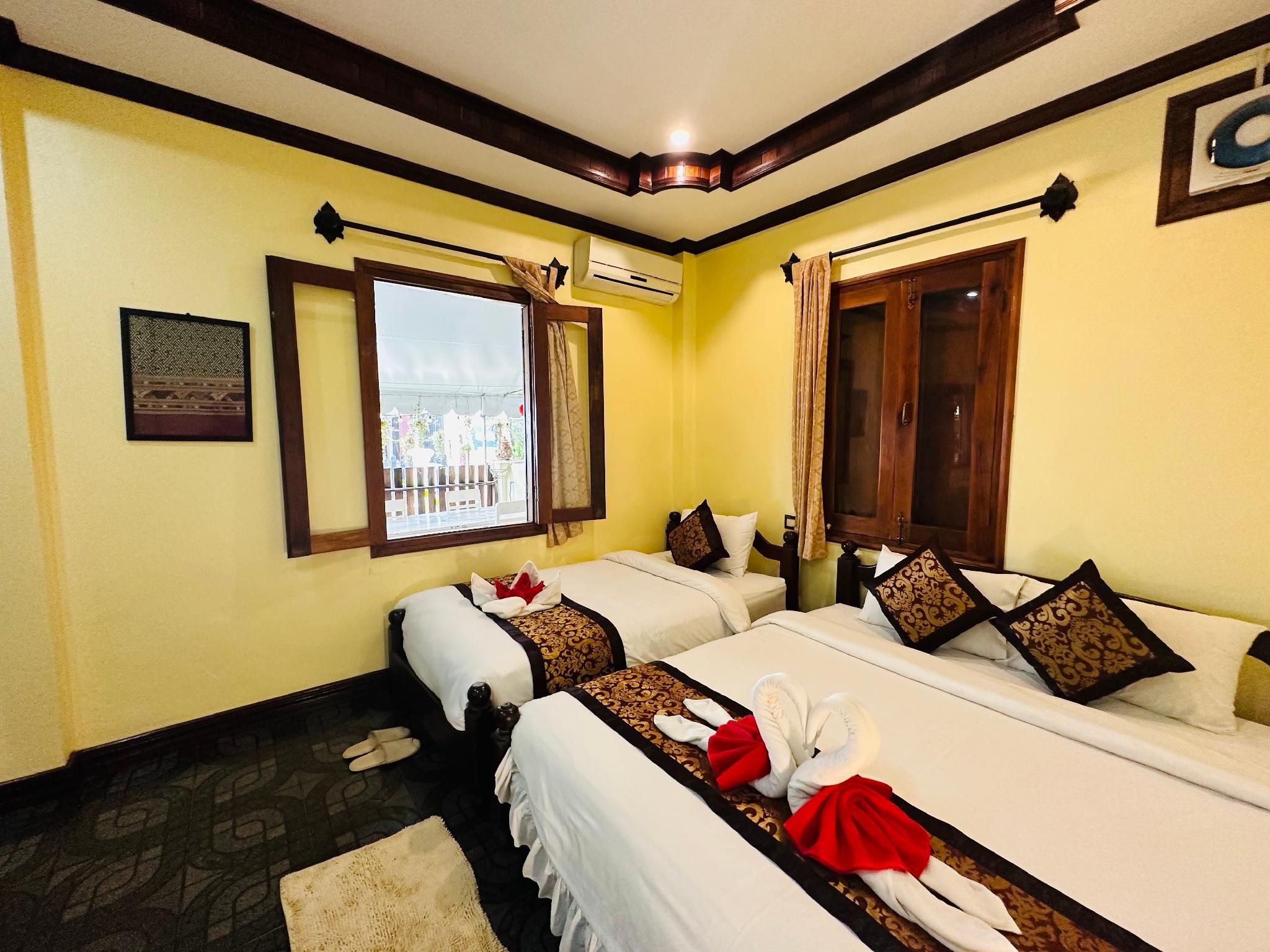 Deluxe Triple Room