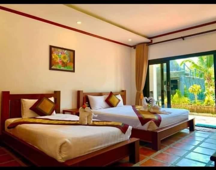Deluxe Triple Room