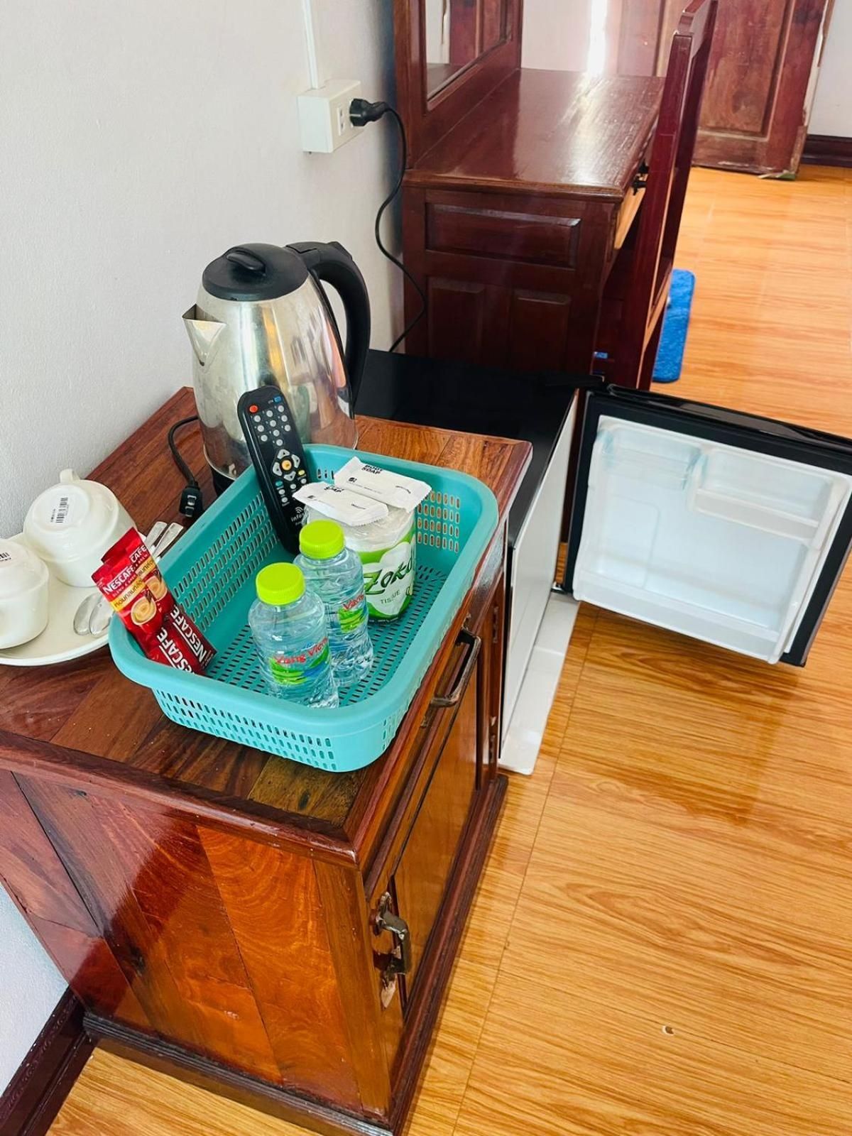 Vang Vieng Global Guesthouse Triple Room with Balcony 3