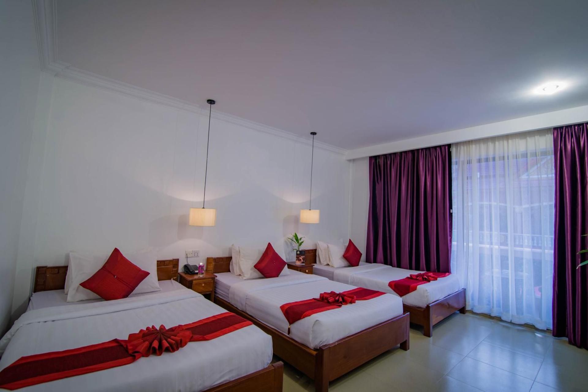 Deluxe Triple Room with Balcony
