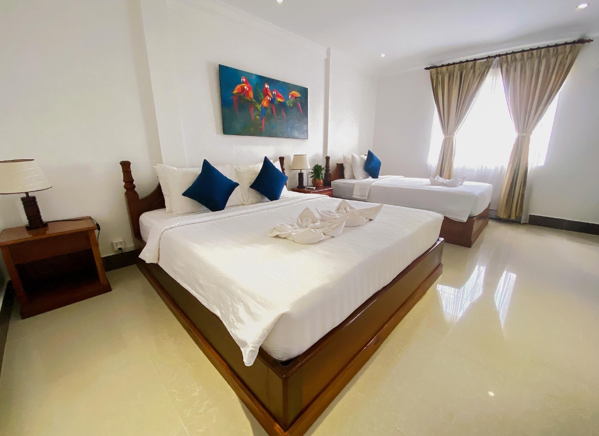 Deluxe Triple Room