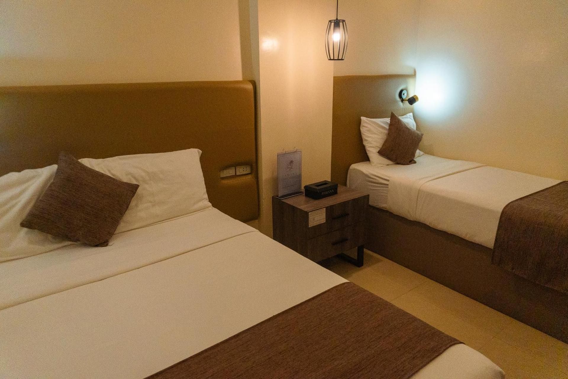 Pamana Resorts and Hotels Deluxe Triple Room 2