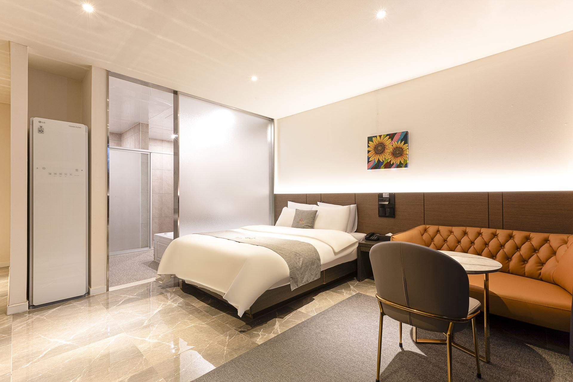 2PC Suite - LG 70 Inch TV, 2 Person Spa Tub, 2 Person Sofa, Styler, Air Purifier, OTT Free