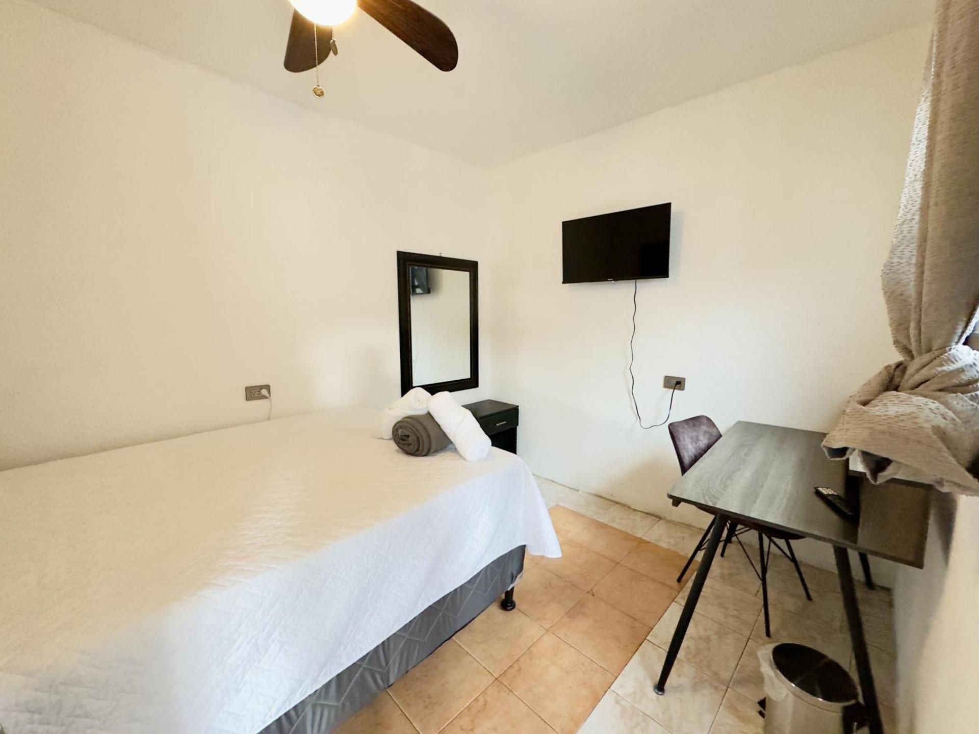 Queen Room with Shared Bathroom