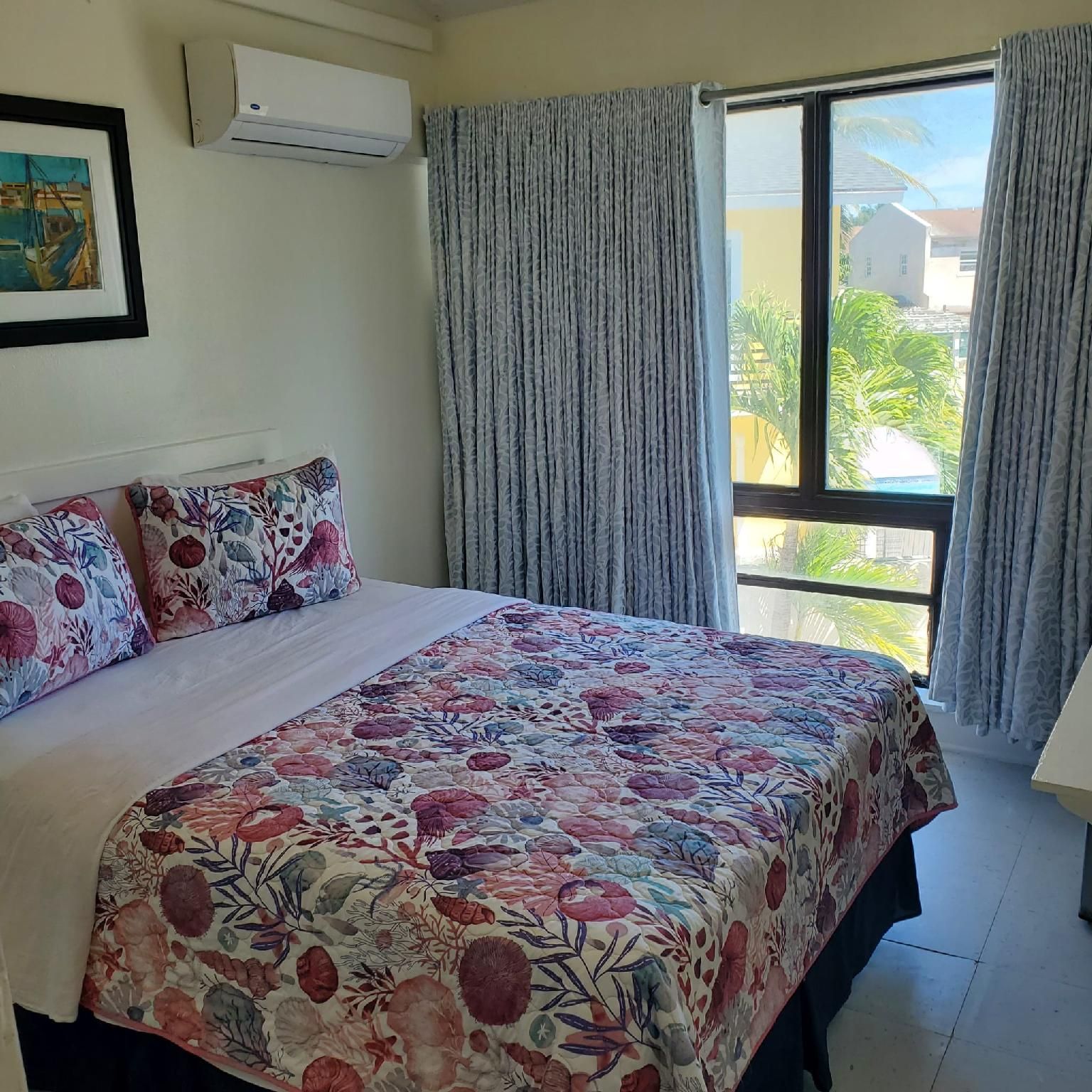 Queen Bed with Patio Room