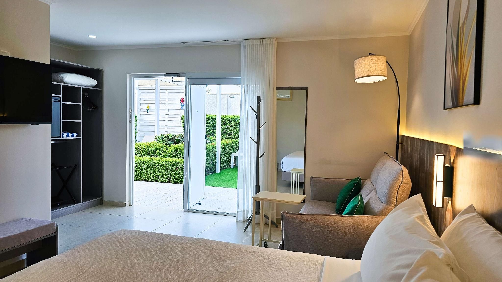 2 Double Beds, Non-Smoking, Pool View, Sofa, Black Out Shades, Adults Only, Mini Fridge