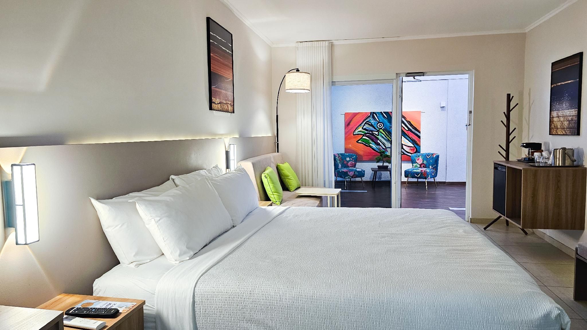 1 King Bed, Non-smoking, Work Desk, Sofa, Black Out Shades, Adults Only, Mini Fridge, Full Breakfast