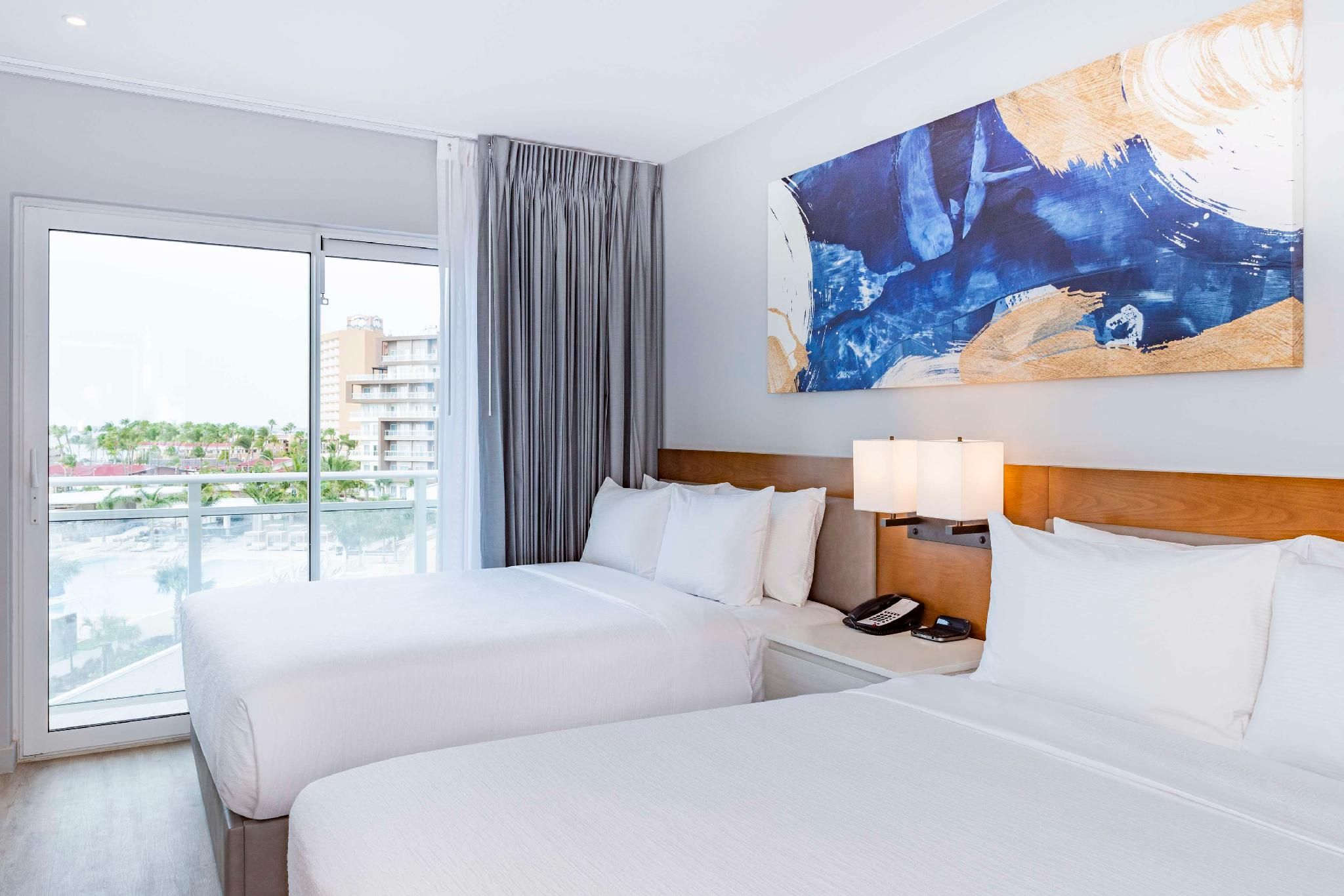 2 QUEEN BEDS 1 BEDROOM SUITE - PARTIAL OCEAN