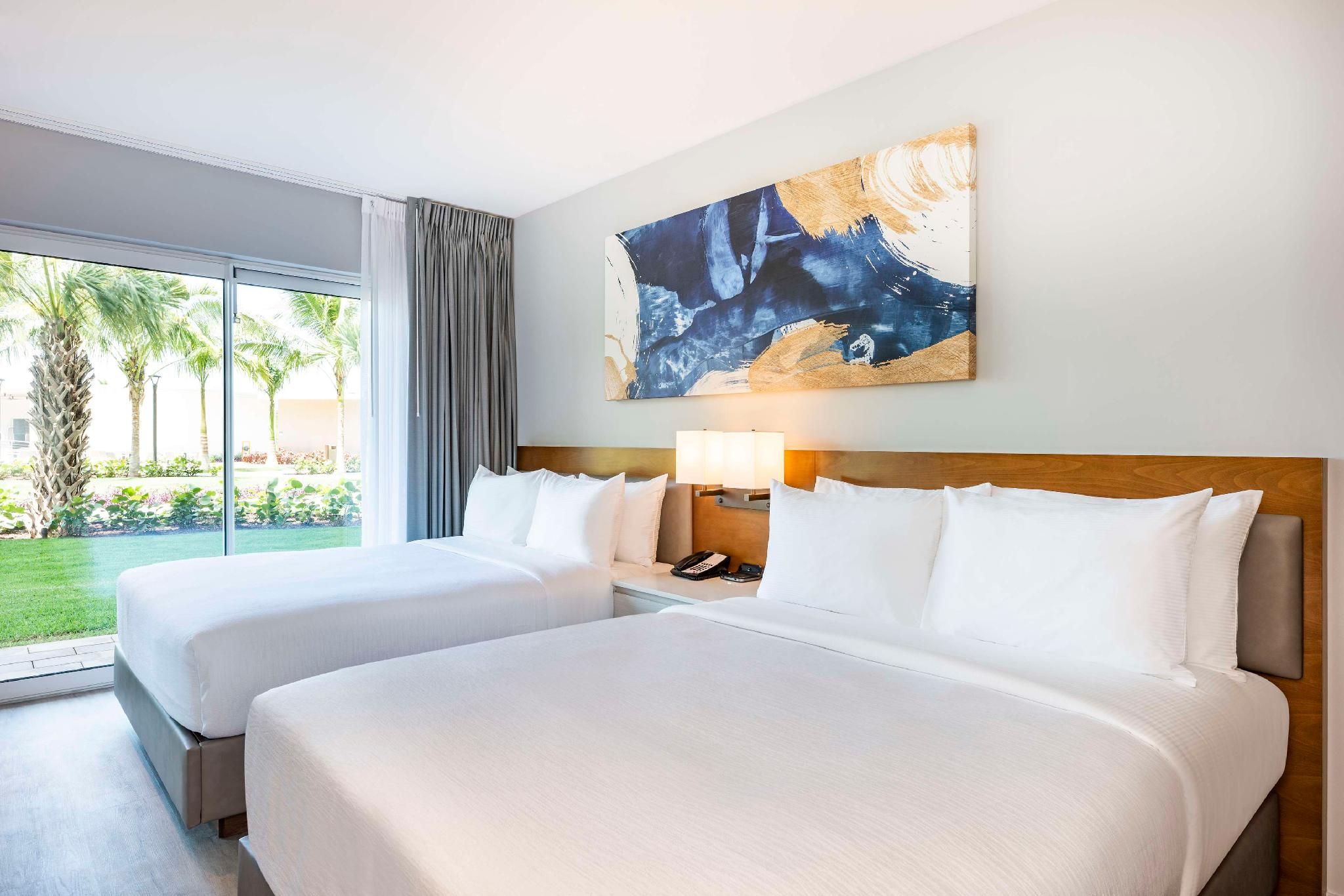 Embassy Suites by Hilton Aruba Resort Pool and Patio 2 Queen Beds 1 Bedroom Suite