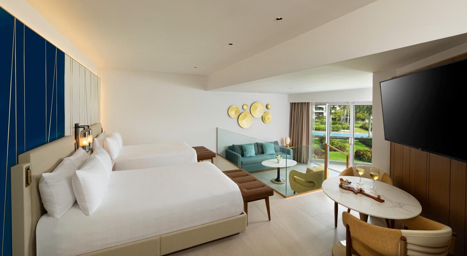 Deluxe Suite Double Beds & Sofa Bed